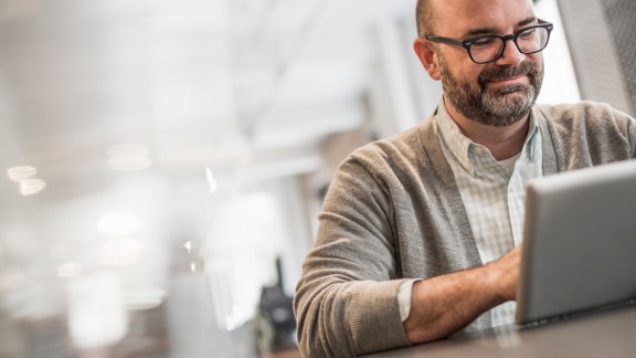 Office life. A man sitting at a table