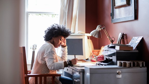 Portrait of woman with cool hair in home office