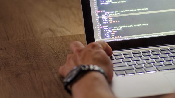 Man working on laptop in office