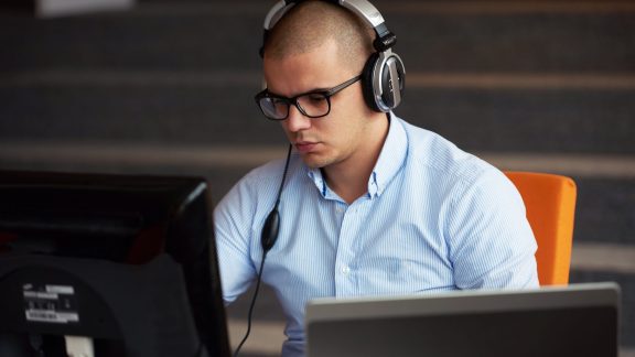 startup business, software developer working on computer at modern office