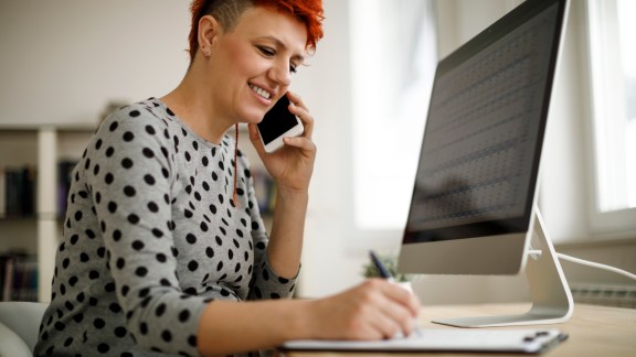 Pregnant woman working from home office