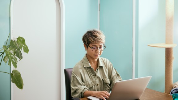 Woman having meeting on laptop