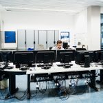 Engineer Working In Factory Control Room